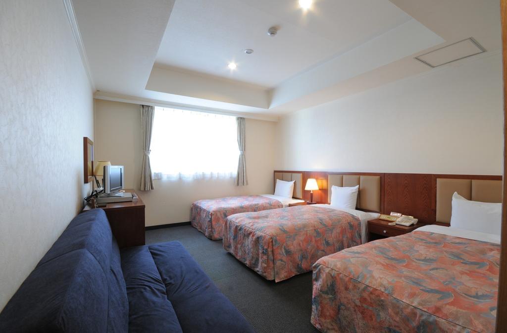 Hotel Chura Ryukyu Naha Habitación foto